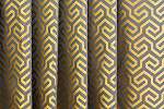 Geometria mintás arany és bronz színű sötétítő függöny textíl