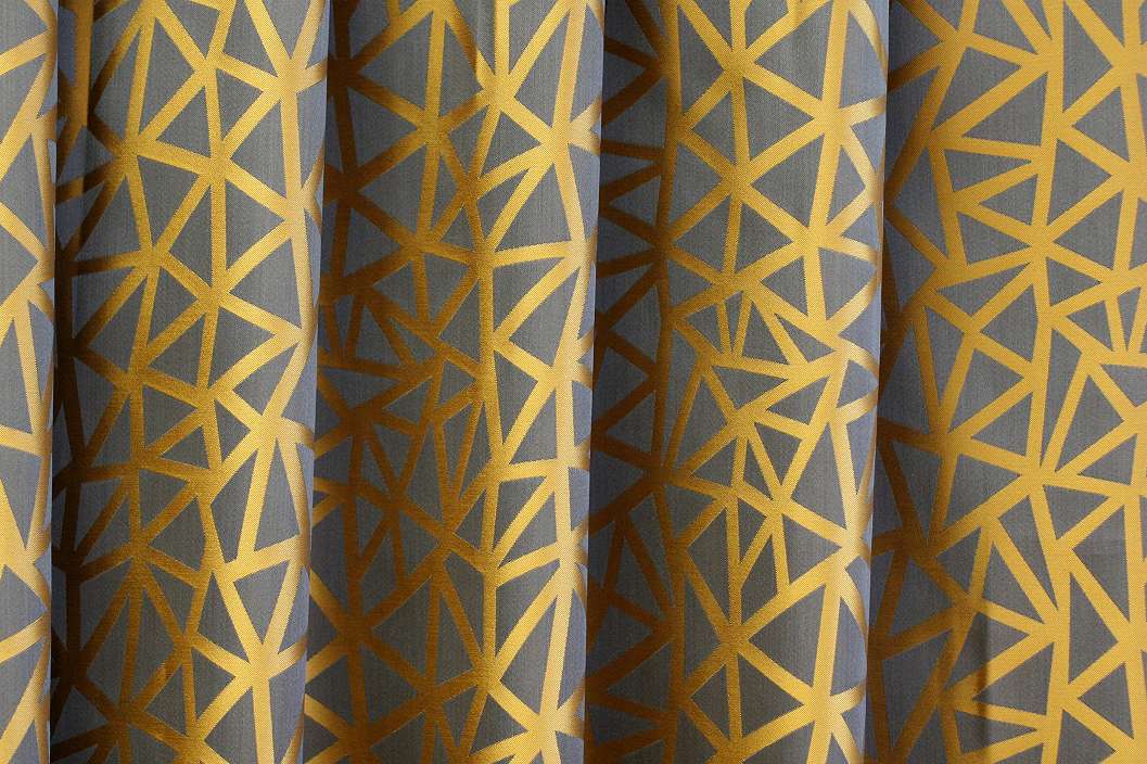 Geometria mintás bronz és arany színű sötétítő függöny textíl
