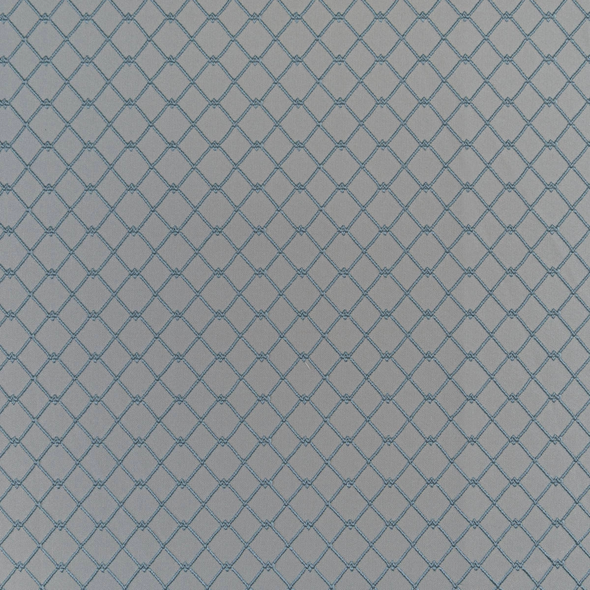 Szürke alapon kékes geometria mintás design sötétítő függöny textil anyag