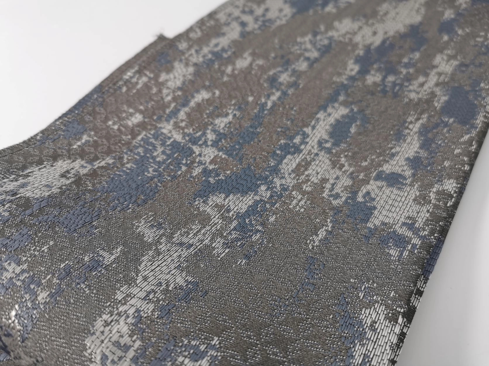 Koptatott mintás szürkés kék és fekete színű sötétítő design függöny textíl