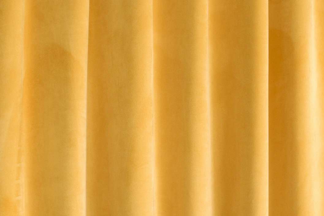 Sötétítő függöny anyag narancssárga színben bársonyos tapintással
